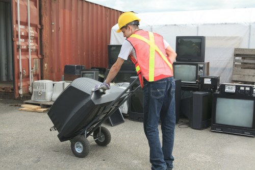 Staff wearing PPE during waste handling operations